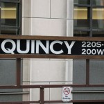 Quincy platform sign