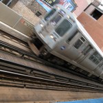 A Purple Line train passes Addison