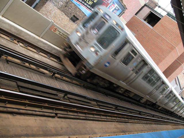 A Purple Line train passes Addison