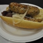 Turkey hot dog with onions and mustard