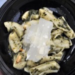 Penne pasta with pesto and shaved parmesan