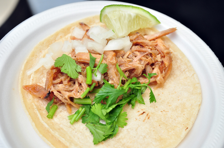 Carnitas taco with cilantro and lime